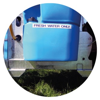 Onboard flush tank