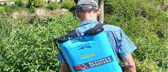Man spraying with a knapsack