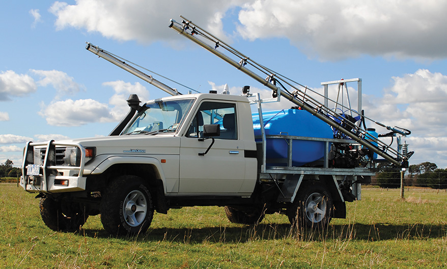 Hydraulic Ute Truck Sprayer in a field