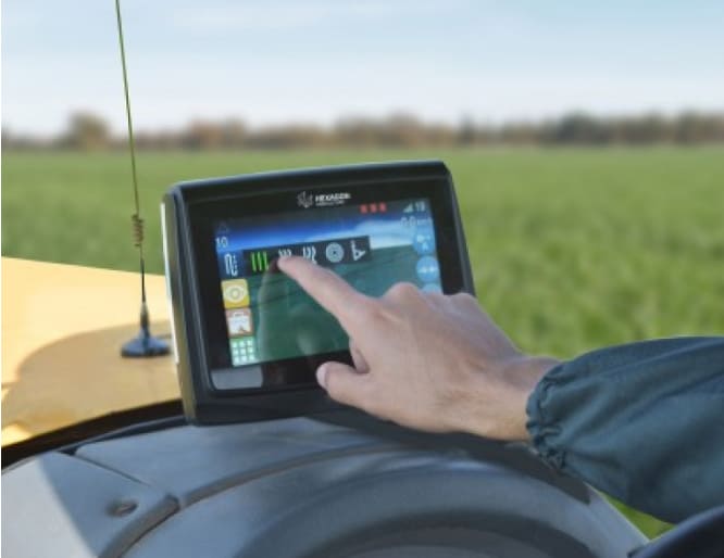Hexagon GPS unit in a tractor cab
