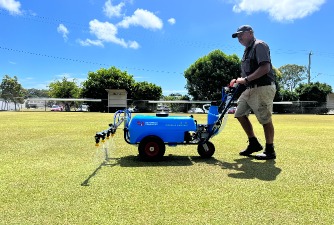 Man using the GK75 on a croquet green
