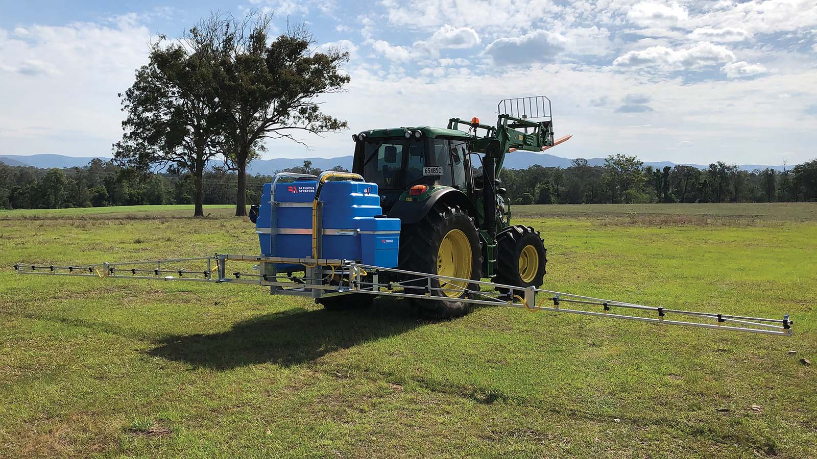 Pasture Pack on a tractor in a field