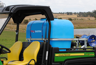 Deckmount Gun Sprayer on the back of a John Deere.