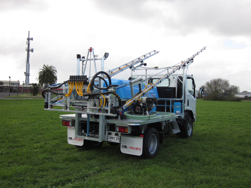 Custom built deck mount sprayer with folding boom