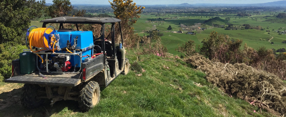 Deckmount sprayer on a n ATV looking over the hills of the waikato