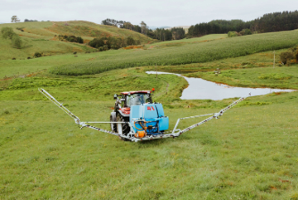 LM Sprayer and M boom with wing tilt on a farm